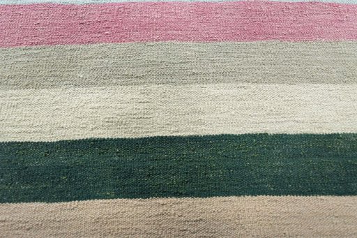 Backside of handmade New Modern Design rug showing knot structure and weave density