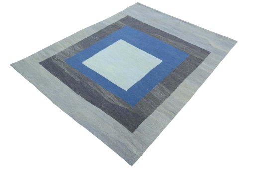 Corner detail of New Modern Design rug showing border pattern and Wool pile