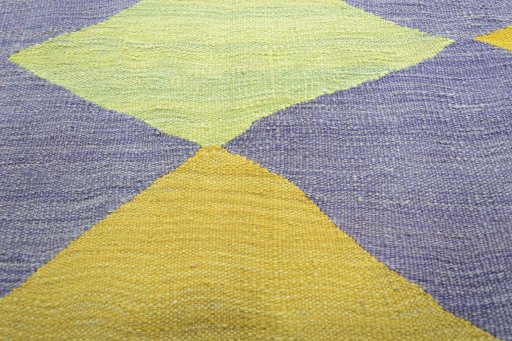 Backside of handmade New Modern Design rug showing knot structure and weave density