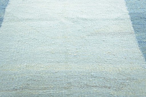 Backside of handmade New Modern Design rug showing knot structure and weave density