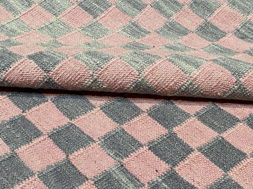 Surface texture of New Modern Design rug with natural Wool and intricate pattern