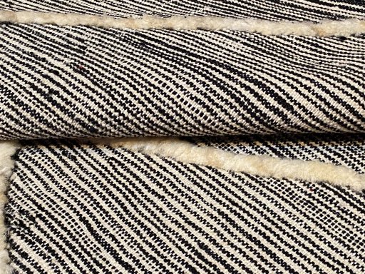 Surface texture of New Modern Design rug with natural Wool and intricate pattern