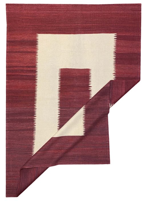 Backside of handmade New Modern Design rug showing knot structure and weave density