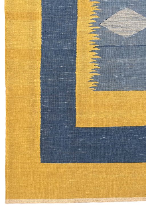 Backside of handmade New Modern Design rug showing knot structure and weave density