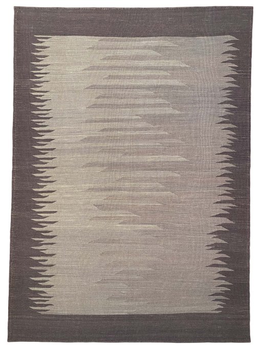 Corner detail of New Modern Design rug showing border pattern and Wool pile