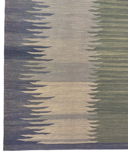 Backside of handmade New Modern Design rug showing knot structure and weave density