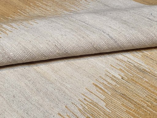 Backside of handmade New Modern Design rug showing knot structure and weave density