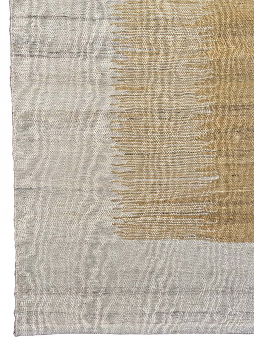 Backside of handmade New Modern Design rug showing knot structure and weave density