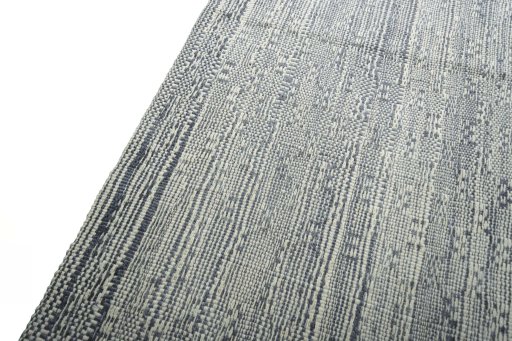 Surface texture of New Modern Design rug with natural Wool and intricate pattern
