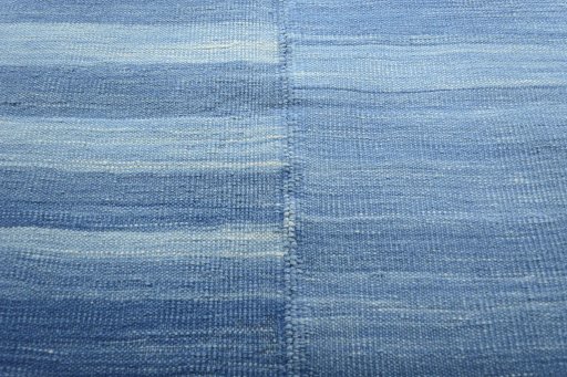 Backside of handmade New Modern Design rug showing knot structure and weave density