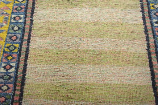 Backside of handmade New Modern Design rug showing knot structure and weave density