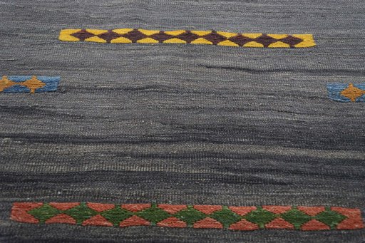 Backside of handmade New Modern Design rug showing knot structure and weave density