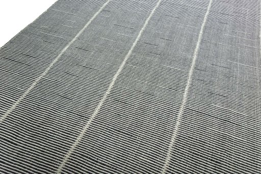 Surface texture of New Modern Design rug with natural Wool and intricate pattern