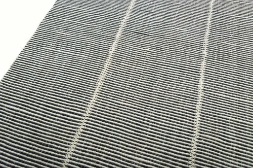 Surface texture of New Modern Design rug with natural Wool and intricate pattern