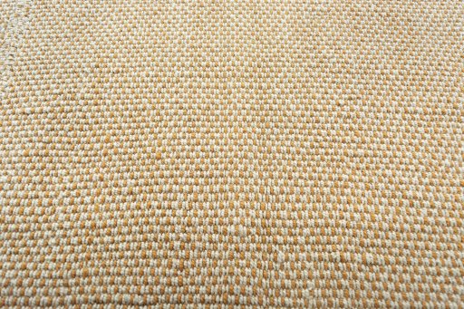 Backside of handmade New Modern Design rug showing knot structure and weave density