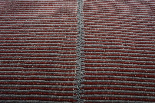 Backside of handmade New Modern Design rug showing knot structure and weave density
