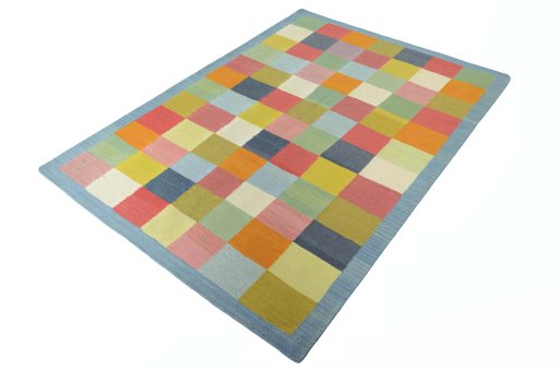 Corner detail of New Modern Design rug showing border pattern and Wool pile