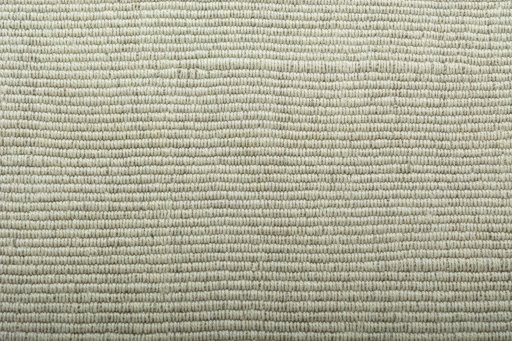 Backside of handmade New Modern Design rug showing knot structure and weave density
