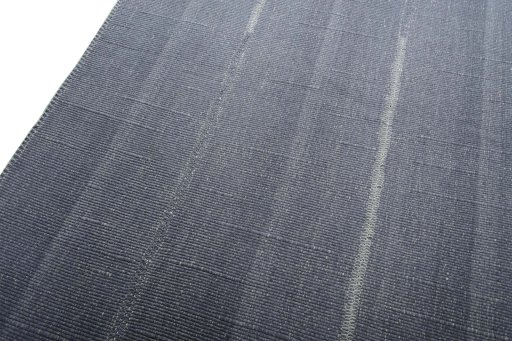 Surface texture of New Modern Design rug with natural Wool and intricate pattern