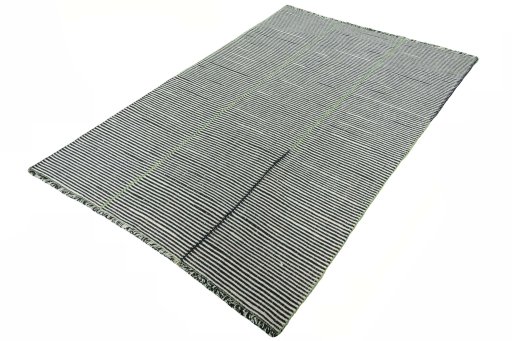 Corner detail of New Modern Design rug showing border pattern and Wool pile