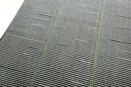Surface texture of New Modern Design rug with natural Wool and intricate pattern