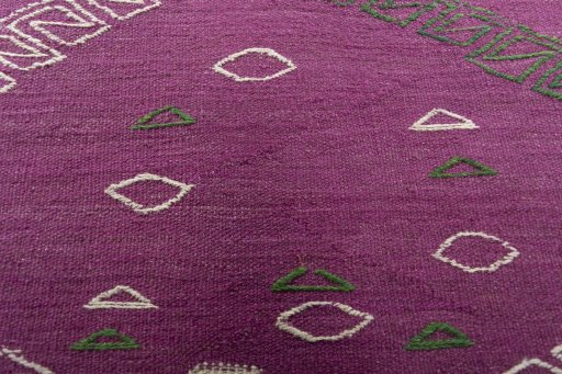 Backside of handmade New Modern Design rug showing knot structure and weave density