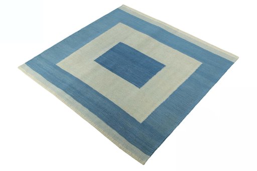 Corner detail of New Modern Design rug showing border pattern and Wool pile