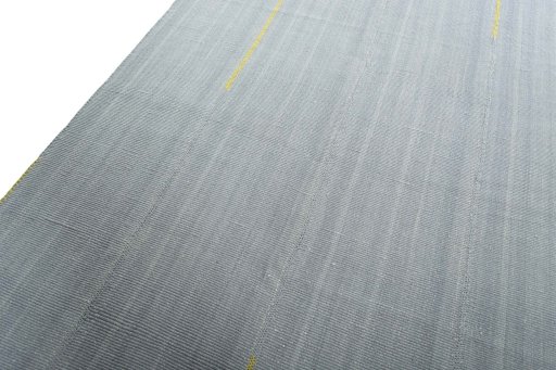 Backside of handmade New Modern Design rug showing knot structure and weave density