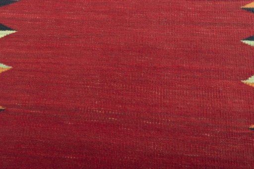 Backside of handmade New Modern Design rug showing knot structure and weave density