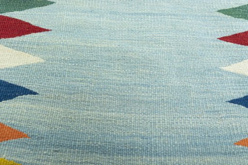 Backside of handmade New Modern Design rug showing knot structure and weave density
