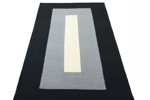 Close-up detail of New Modern Design rug from Iran / Persia showing Wool weave