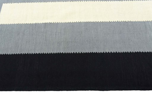 Close-up detail of New Modern Design rug from Iran / Persia showing Wool weave