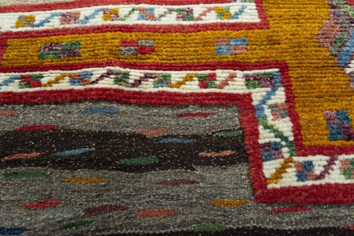 Backside of handmade New Modern Design rug showing knot structure and weave density
