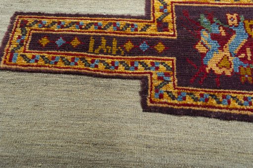 Backside of handmade New Modern Design rug showing knot structure and weave density