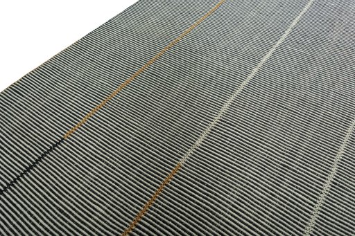 Surface texture of New Modern Design rug with natural Wool and intricate pattern