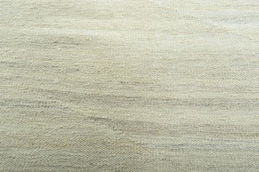 Backside of handmade New Modern Design rug showing knot structure and weave density