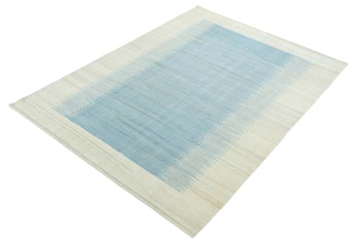 Corner detail of New Modern Design rug showing border pattern and Wool pile