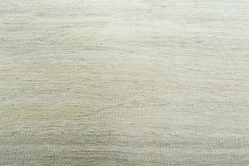 Backside of handmade New Modern Design rug showing knot structure and weave density
