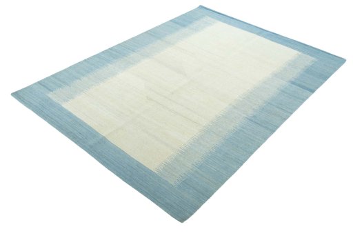 Corner detail of New Modern Design rug showing border pattern and Wool pile