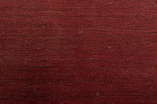 Backside of handmade New Modern Design rug showing knot structure and weave density