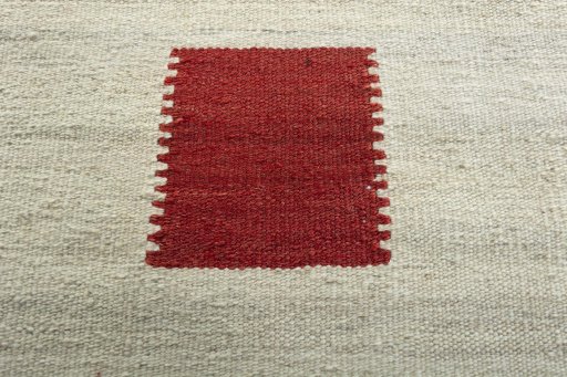 Backside of handmade New Modern Design rug showing knot structure and weave density