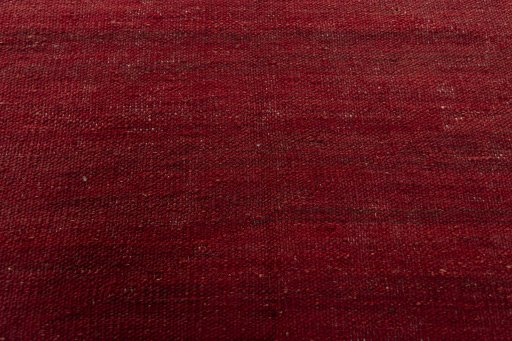 Backside of handmade New Modern Design rug showing knot structure and weave density