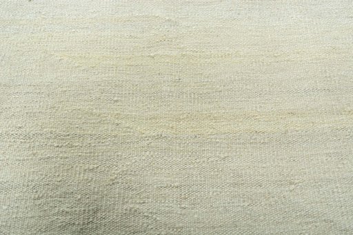 Backside of handmade New Modern Design rug showing knot structure and weave density