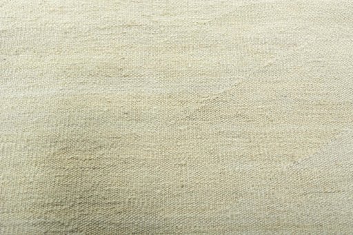 Backside of handmade New Modern Design rug showing knot structure and weave density