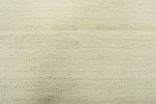 Backside of handmade New Modern Design rug showing knot structure and weave density