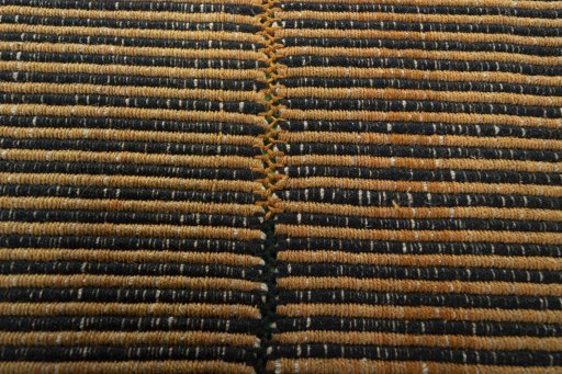 Backside of handmade New Modern Design rug showing knot structure and weave density