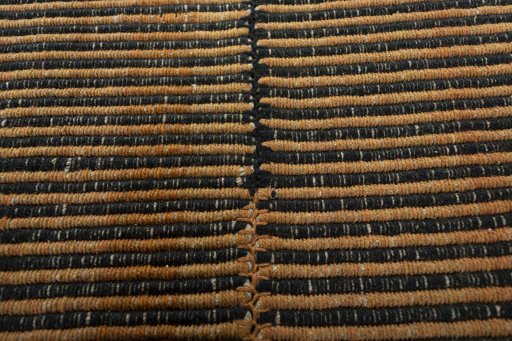 Backside of handmade New Modern Design rug showing knot structure and weave density