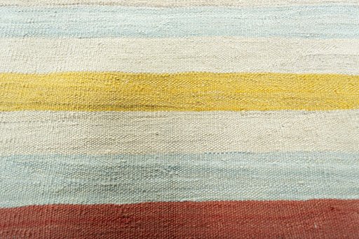Backside of handmade New Modern Design rug showing knot structure and weave density
