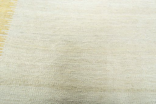 Backside of handmade New Modern Design rug showing knot structure and weave density