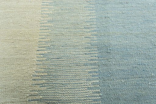 Backside of handmade New Modern Design rug showing knot structure and weave density